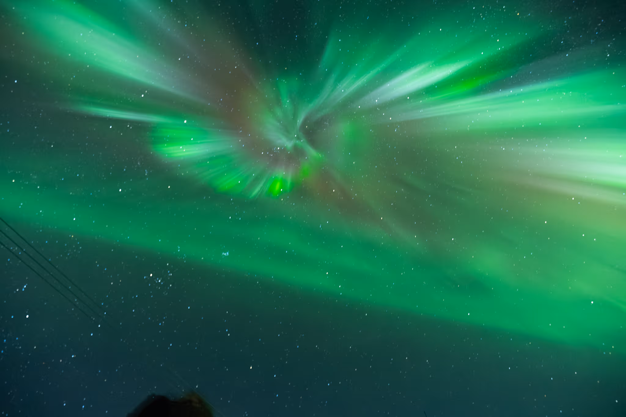 Green aurora curtains over Lapland