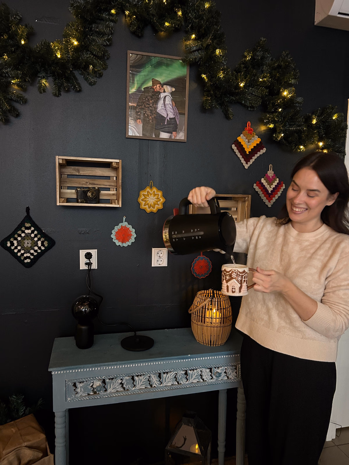 Hot chocolate being poured into a festive mug at the workshop